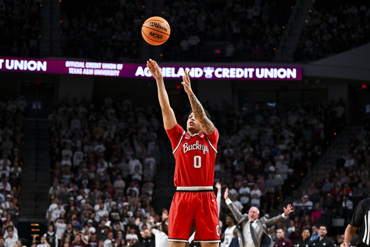 Nov 15, 2024; College Station, Texas, USA; Ohio State Buckeyes guard John Mobley Jr. (0) shoots a three point basket during the second half against the Texas A&M Aggies at Reed Arena. Mandatory Credit: Maria Lysaker-Imagn Images