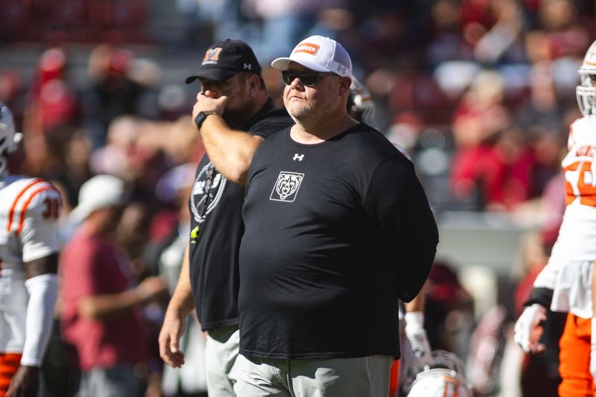 Nov 16, 2024; Tuscaloosa, Alabama, USA; Mercer Bears head coach Mike Jacobs watches warmups at Bryant-Denny Stadium. Mandatory Credit: Will McLelland-Imagn Images