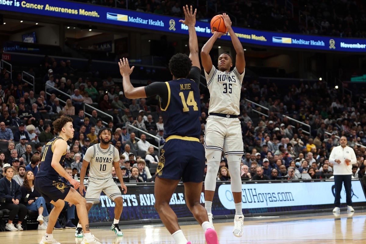 Nov 16, 2024; Washington, District of Columbia, USA; Georgetown Hoyas forward Thomas Sorber (35) takes a shot over Notre Dame Fighting Irish forward Kebba Njie (14) during the first half at Capital One Arena. Mandatory Credit: Daniel Kucin Jr.-Imagn Images