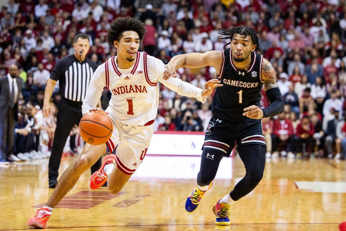 Nov 16, 2024; Bloomington, Indiana, USA; Indiana Hoosiers guard Myles Rice (1) dribbles the ball while South Carolina Gamecocks guard Jacobi Wright (1) defends in the first half at Simon Skjodt Assembly Hall. Mandatory Credit: Trevor Ruszkowski-Imagn Images