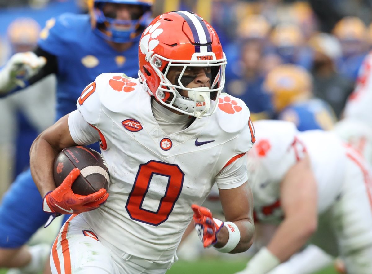 Nov 16, 2024; Pittsburgh, Pennsylvania, USA; Clemson Tigers wide receiver Antonio Williams (0) runs the ball against the Pittsburgh Panthers during the fourth quarter at Acrisure Stadium. Mandatory Credit: Charles LeClaire-Imagn Images
