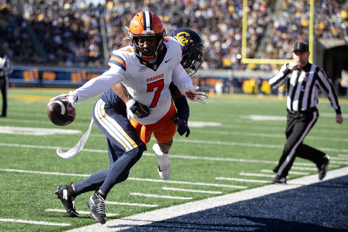 Nov 16, 2024; Berkeley, California, USA; Syracuse Orange wide receiver Jackson Meeks (7) stretches for the goal line as he is pushed out of bounds by California Golden Bears defensive back Nohl Williams (3) during the second quarter at California Memorial Stadium. Mandatory Credit: D. Ross Cameron-Imagn Images