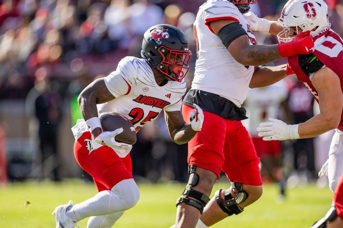 Nov 16, 2024; Stanford, California, USA;  Louisville Cardinals running back Isaac Brown (25) runs the ball during the first quarter against the Stanford Cardinal at Stanford Stadium. Mandatory Credit: Bob Kupbens-Imagn Images