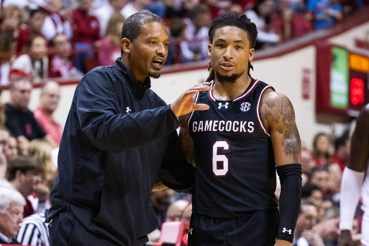 Nov 16, 2024; Bloomington, Indiana, USA; South Carolina Gamecocks head coach Lamont Paris and  guard Jamarii Thomas (6)   in the second half against the Indiana Hoosiers at Simon Skjodt Assembly Hall. Mandatory Credit: Trevor Ruszkowski-Imagn Images