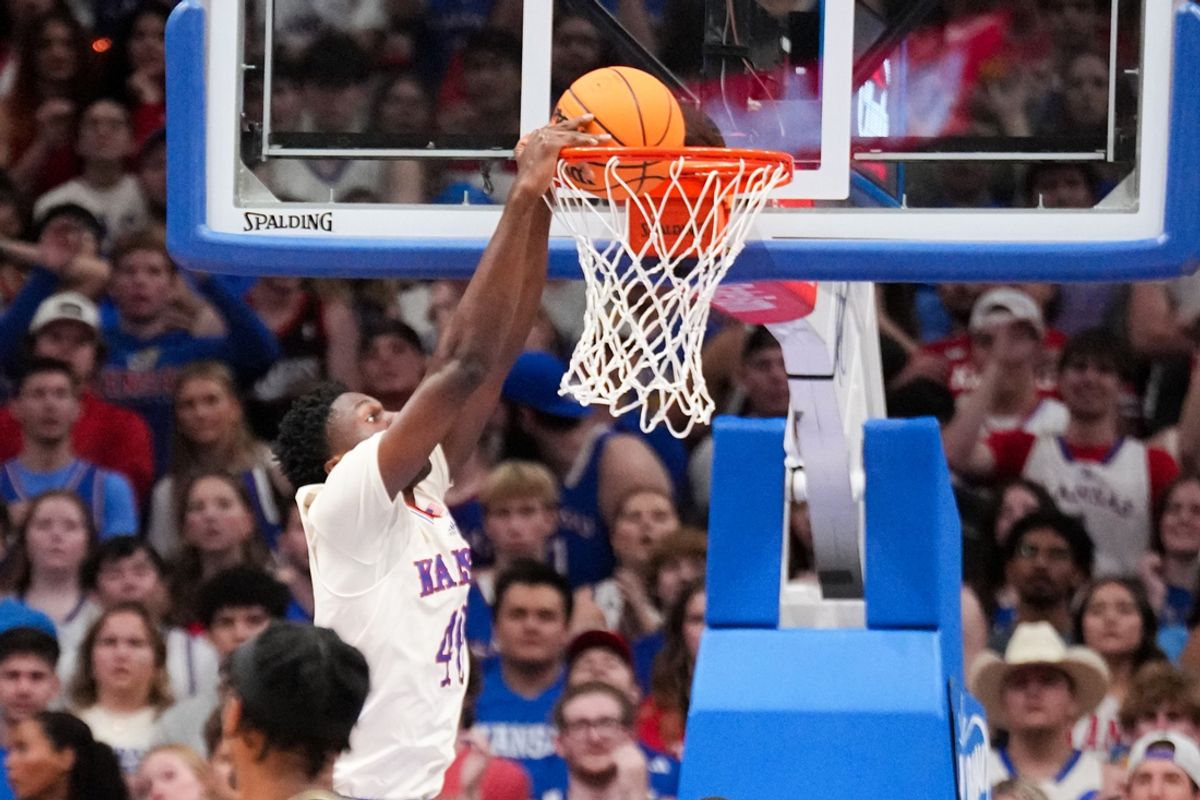 Nov 16, 2024; Lawrence, Kansas, USA; Kansas Jayhawks forward Flory Bidunga (40) dunks the ball against the Oakland Golden Grizzlies during the first half at Allen Fieldhouse. Mandatory Credit: Denny Medley-Imagn Images