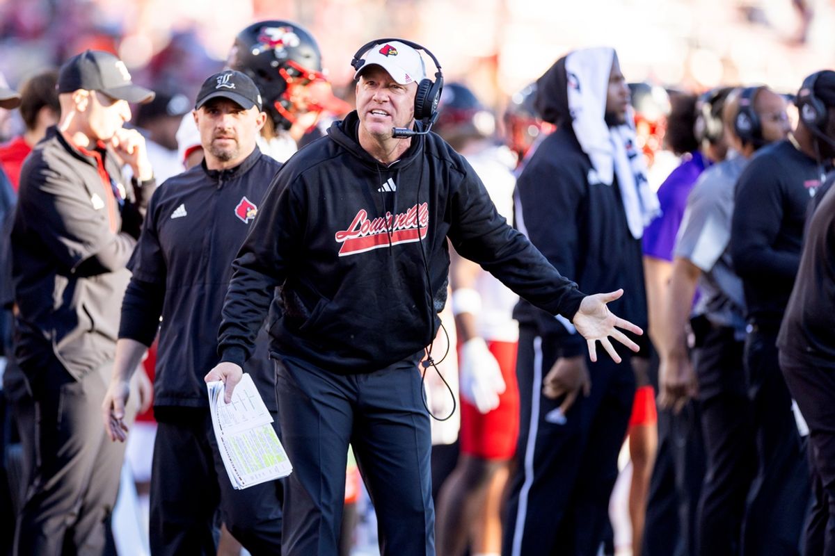 Nov 16, 2024; Stanford, California, USA;  Louisville Cardinals head coach Jeff Brohm protests a call during the fourth quarter against the Stanford Cardinal at Stanford Stadium. Mandatory Credit: Bob Kupbens-Imagn Images