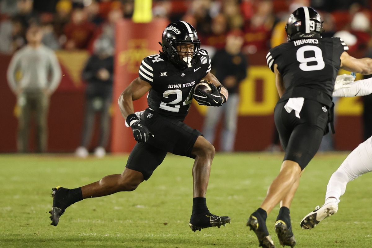 Nov 16, 2024; Ames, Iowa, USA; Iowa State Cyclones running back Abu Sama III (24) runs the football against the Cincinnati Bearcats in the first half at Jack Trice Stadium. Mandatory Credit: Reese Strickland-Imagn Images