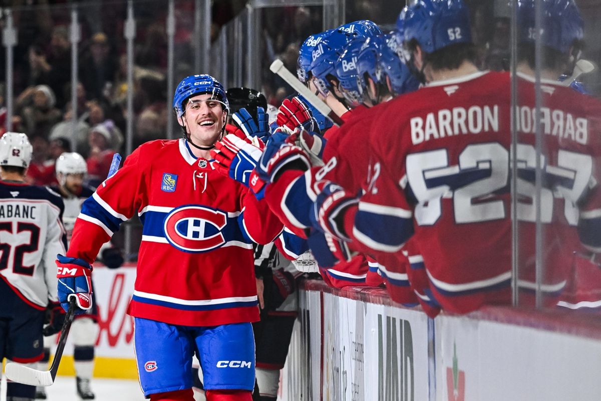 Nov 16, 2024; Montreal, Quebec, CAN; Montreal Canadiens left wing Lucas Condotta (82) celebrates his goal against the Columbus Blue Jackets with his teammates at the bench during the third period at Bell Centre. Mandatory Credit: David Kirouac-Imagn Images