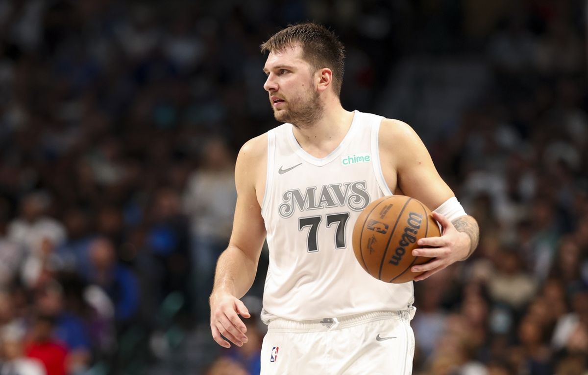 Nov 16, 2024; Dallas, Texas, USA;  Dallas Mavericks guard Luka Doncic (77) controls the ball during the second half against the San Antonio Spurs at American Airlines Center. Mandatory Credit: Kevin Jairaj-Imagn Images