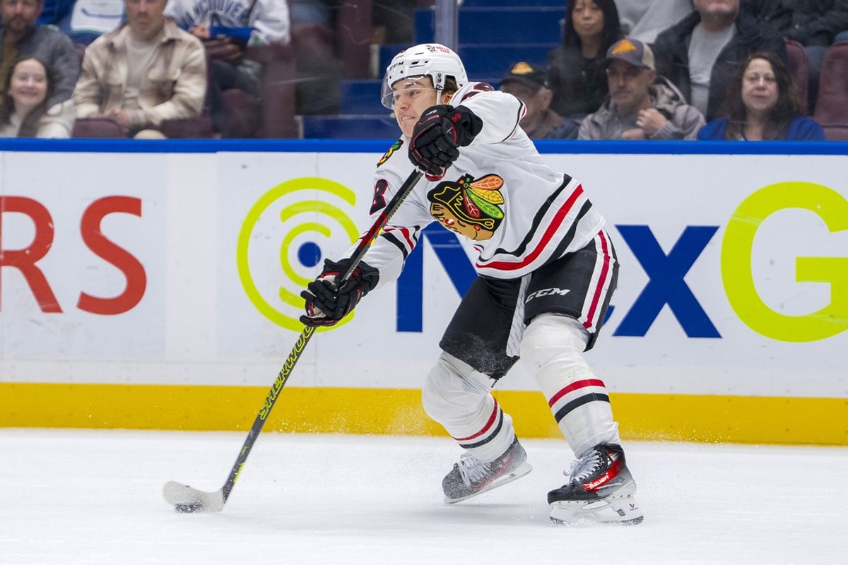 Nov 16, 2024; Vancouver, British Columbia, CAN; Chicago Blackhawks forward Connor Bedard (98) makes a pass against the Vancouver Canucks during the third period at Rogers Arena. Mandatory Credit: Bob Frid-Imagn Images
