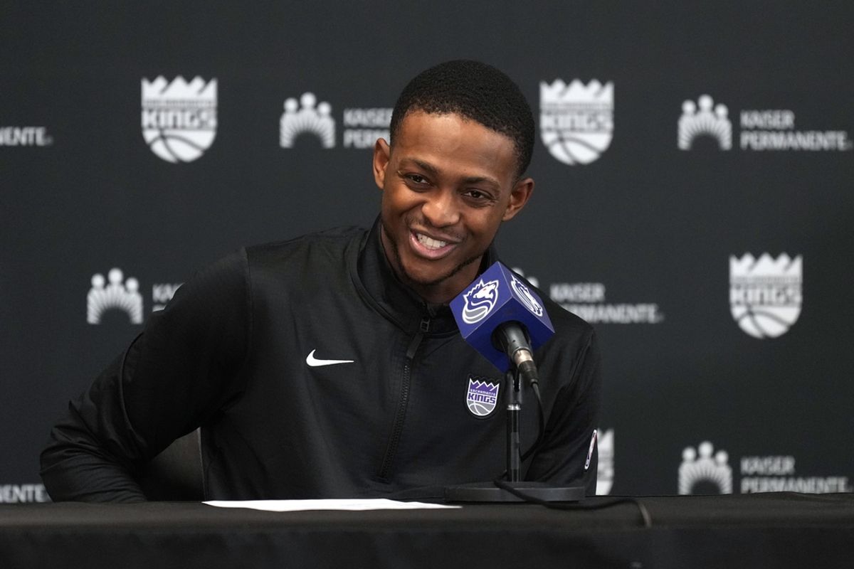 Nov 16, 2024; Sacramento, California, USA; Sacramento Kings guard De'Aaron Fox (5) talks to media members after defeating the Utah Jazz at Golden 1 Center. Mandatory Credit: Darren Yamashita-Imagn Images