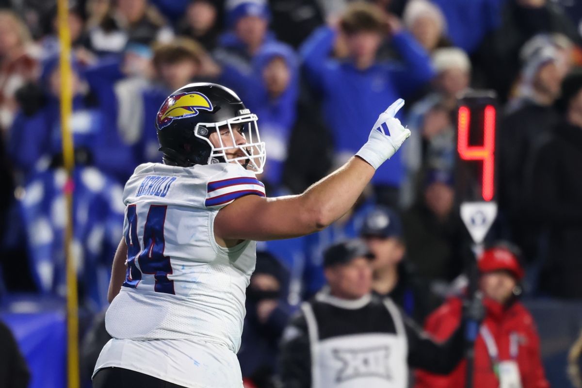 Nov 16, 2024; Provo, Utah, USA; Kansas Jayhawks defensive tackle Blake Herold (94) runs off the field after a fourth down stop on the Brigham Young Cougars during the fourth quarter at LaVell Edwards Stadium. Mandatory Credit: Rob Gray-Imagn Images