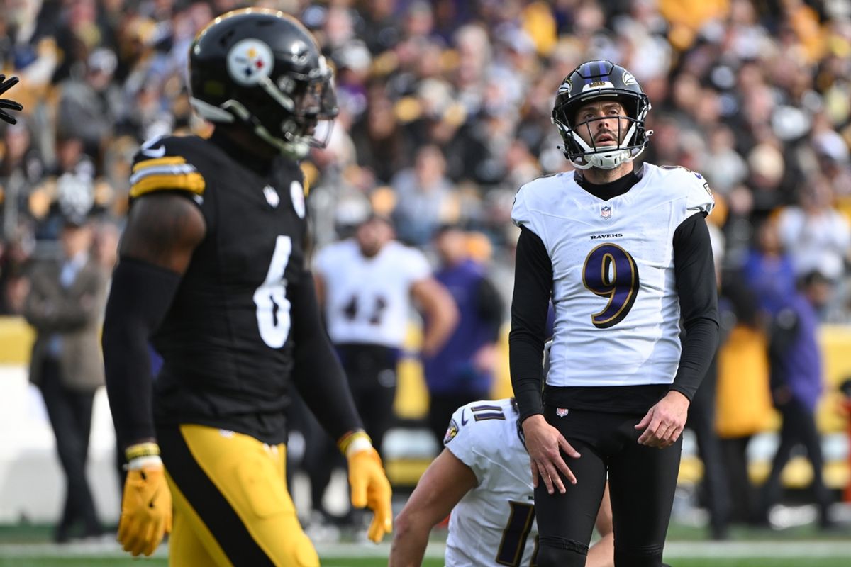 Baltimore Ravens place kicker Justin Tucker (9) reacts to a missed field goal against the Pittsburgh Steelers during the first quarter at Acrisure Stadium. Mandatory Credit: Barry Reeger-Imagn Images