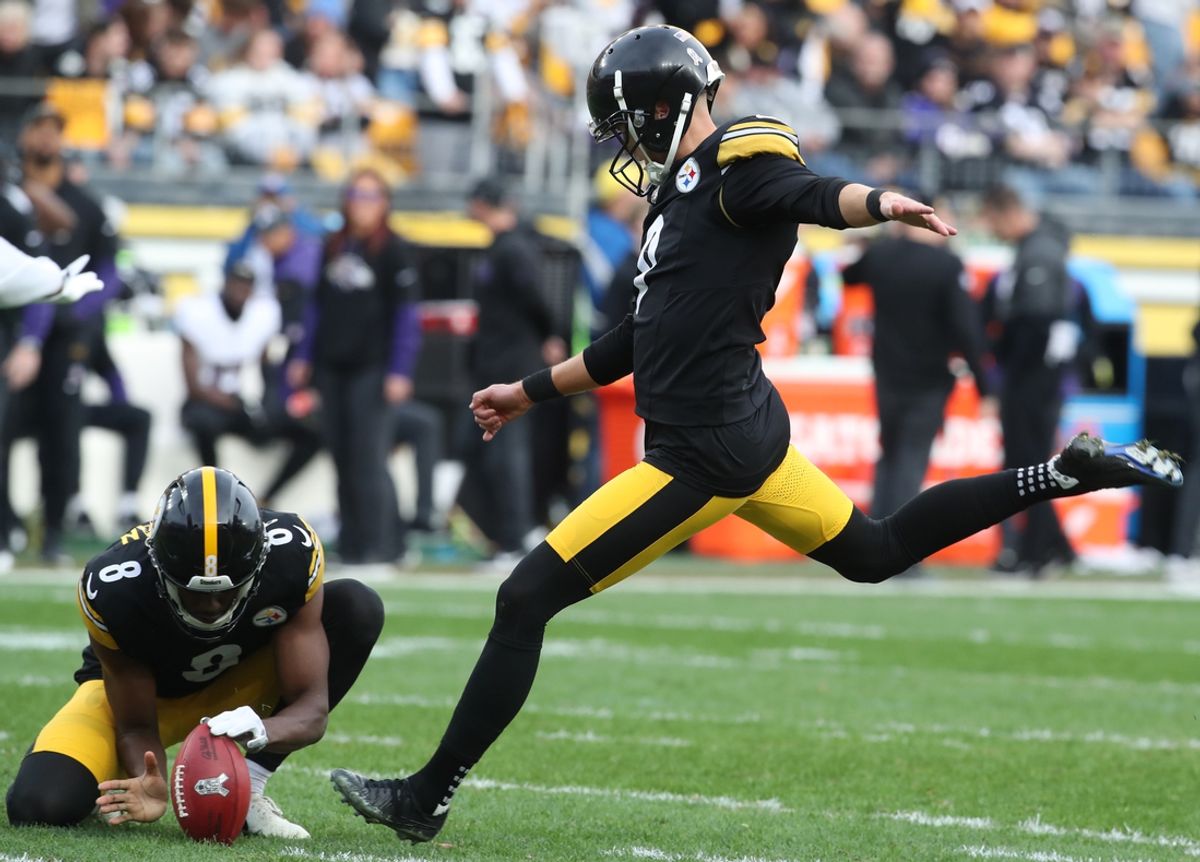 Nov 17, 2024; Pittsburgh, Pennsylvania, USA;  Pittsburgh Steelers place kicker Chris Boswell (9) kicks a field goal from the hold of punter Corliss Waitman (8) against the Baltimore Ravens during the third quarter at Acrisure Stadium. Mandatory Credit: Charles LeClaire-Imagn Images