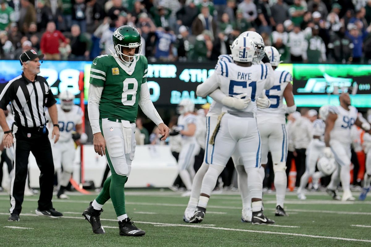 Nov 17, 2024; East Rutherford, New Jersey, USA; New York Jets quarterback Aaron Rodgers (8) walks off the field after losing to the Indianapolis Colts at MetLife Stadium. Mandatory Credit: Brad Penner-Imagn Images