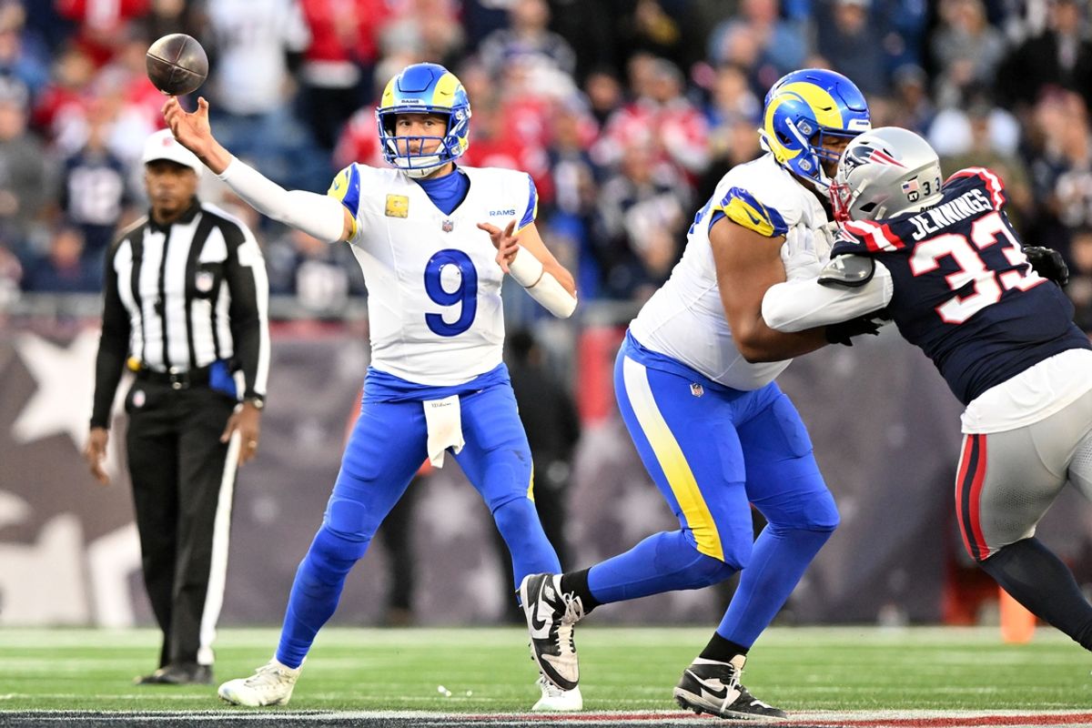 Nov 17, 2024; Foxborough, Massachusetts, USA; Los Angeles Rams quarterback Matthew Stafford (9) throws the ball against the New England Patriots during the second half at Gillette Stadium. Mandatory Credit: Brian Fluharty-Imagn Images