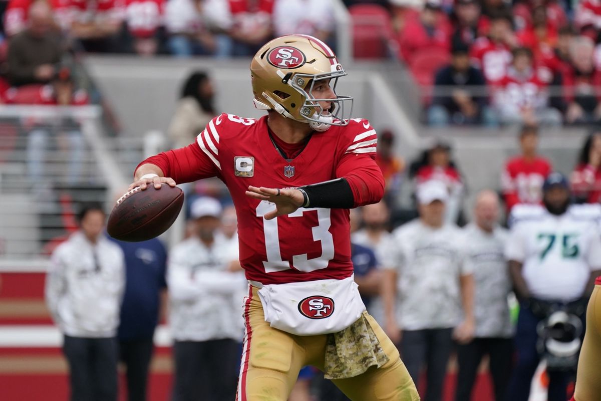 Nov 17, 2024; Santa Clara, California, USA; San Francisco 49ers quarterback Brock Purdy (13) throws a pass against the Seattle Seahawks in the second quarter at Levi's Stadium. Mandatory Credit: David Gonzales-Imagn Images