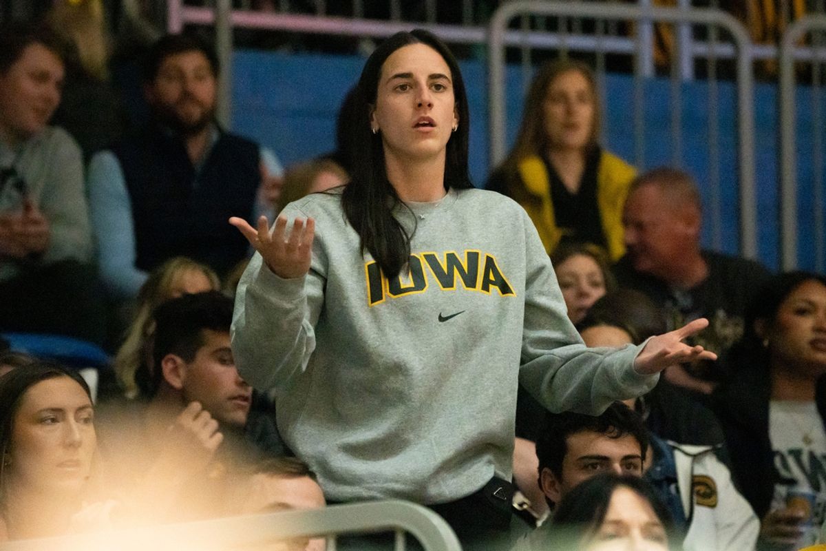 Former Iowa women's basketball player Caitlin Clark reacts after a foul call on Iowa during the Drake vs. Iowa basketball game at Knapp Center on Sunday, Nov. 17, 2024, in Des Moines.