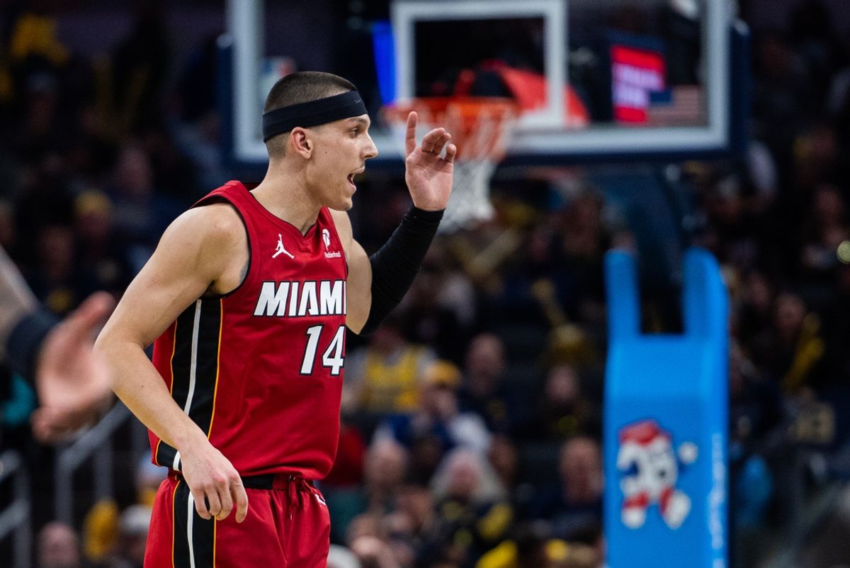 Nov 17, 2024; Indianapolis, Indiana, USA; Miami Heat guard Tyler Herro (14) celebrates a made basket  in the second half against the Indiana Pacers at Gainbridge Fieldhouse. Mandatory Credit: Trevor Ruszkowski-Imagn Images