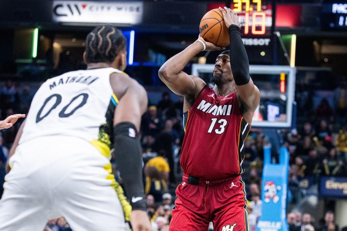 Nov 17, 2024; Indianapolis, Indiana, USA; Miami Heat center Bam Adebayo (13) shoots the ball in the second half against the Indiana Pacers at Gainbridge Fieldhouse. Mandatory Credit: Trevor Ruszkowski-Imagn Images