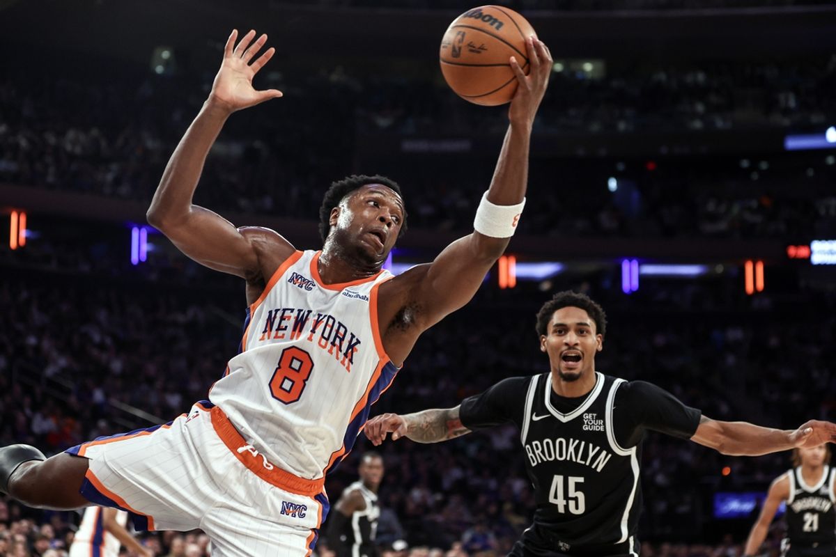 Nov 17, 2024; New York, New York, USA;  New York Knicks forward OG Anunoby (8) grabs a rebound in the first quarter against the Brooklyn Nets at Madison Square Garden. Mandatory Credit: Wendell Cruz-Imagn Images