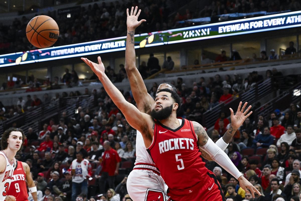 Nov 17, 2024; Chicago, Illinois, USA;  Houston Rockets guard Fred VanVleet (5) shoots against Chicago Bulls forward Dalen Terry (25) during the first half at United Center. Mandatory Credit: Matt Marton-Imagn Images