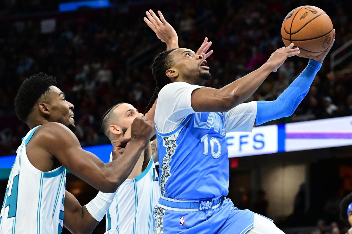 Nov 17, 2024; Cleveland, Ohio, USA; Cleveland Cavaliers guard Darius Garland (10) drives to the basket against during the second half against the Charlotte Hornets at Rocket Mortgage FieldHouse. Mandatory Credit: Ken Blaze-Imagn Images