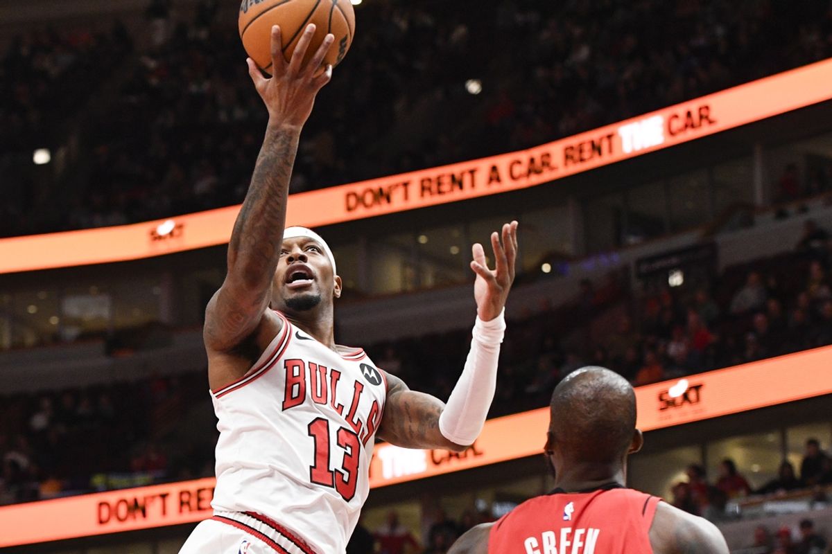 Nov 17, 2024; Chicago, Illinois, USA;  Chicago Bulls forward Torrey Craig (13) drives to the basket against Houston Rockets forward Jeff Green (32) during the second half at United Center. Mandatory Credit: Matt Marton-Imagn Images