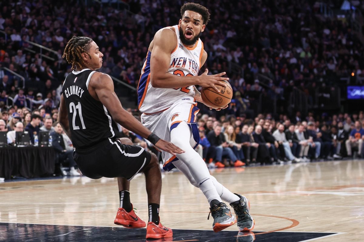 Nov 17, 2024; New York, New York, USA;  New York Knicks center Karl-Anthony Towns (32) collides with Brooklyn Nets forward Noah Clowney (21) in the third quarter at Madison Square Garden. Mandatory Credit: Wendell Cruz-Imagn Images