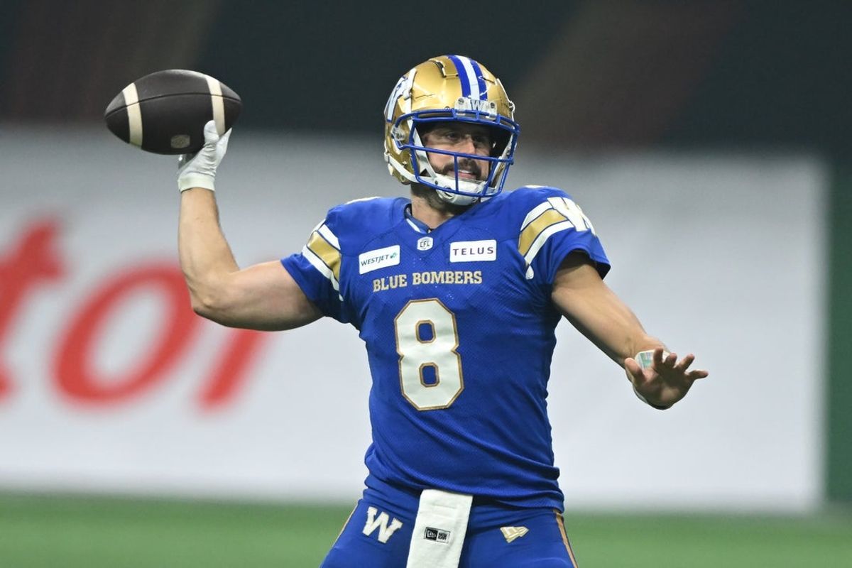 Nov 17, 2024; Vancouver, British Columbia, CAN;   Winnipeg Blue Bombers quarterback Zach Collaros (8) looks to throw a pass during the fourth quarter against Toronto Argonauts at BC Place. Mandatory Credit: Anne-Marie Sorvin-Imagn Images