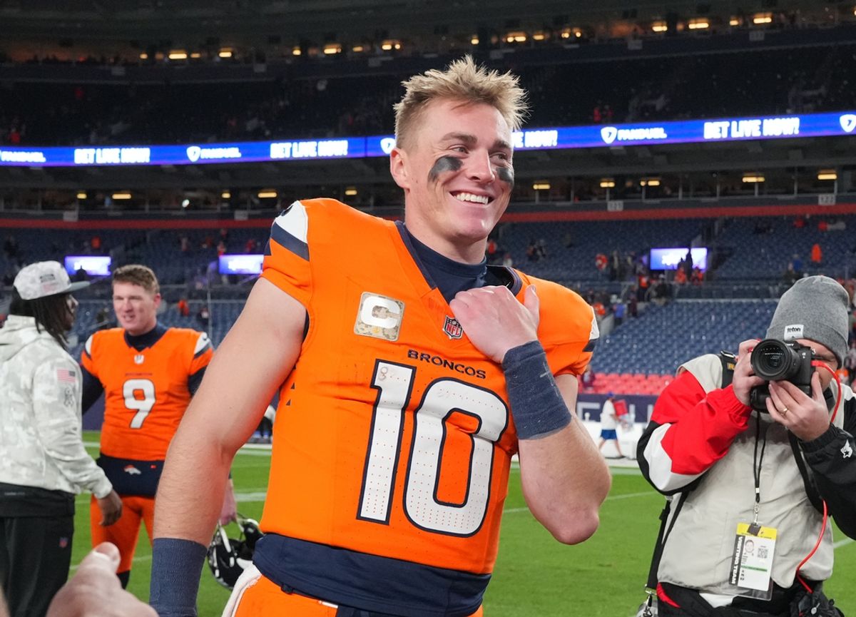 Nov 17, 2024; Denver, Colorado, USA; Denver Broncos quarterback Bo Nix (10) reacts following the win over the Atlanta Falcons at Empower Field at Mile High. Mandatory Credit: Ron Chenoy-Imagn Images
