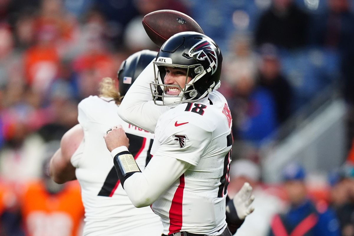 Nov 17, 2024; Denver, Colorado, USA; Atlanta Falcons quarterback Kirk Cousins (18) prepares to pass the ball in the fourth quarter against the Denver Broncos at Empower Field at Mile High. Mandatory Credit: Ron Chenoy-Imagn Images