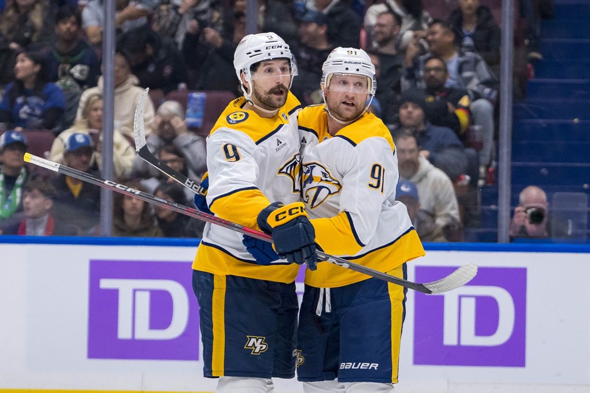Nov 17, 2024; Vancouver, British Columbia, CAN; Nashville Predators forward Filip Forsberg (9) and forward Steven Stamkos (91) celebrate Stamkos’ second goal against the Vancouver Canucks during the second period at Rogers Arena. Mandatory Credit: Bob Frid-Imagn Images