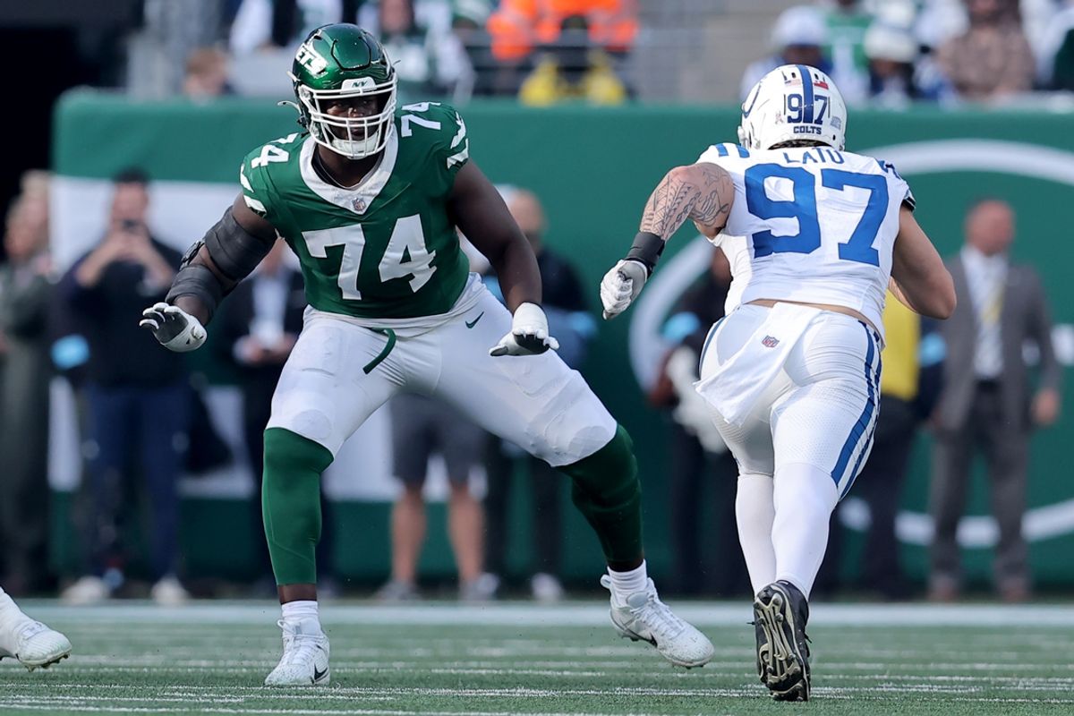 Nov 17, 2024; East Rutherford, New Jersey, USA; New York Jets offensive tackle Olu Fashanu (74) blocks against Indianapolis Colts defensive end Laiatu Latu (97) during the second quarter at MetLife Stadium. Mandatory Credit: Brad Penner-Imagn Images