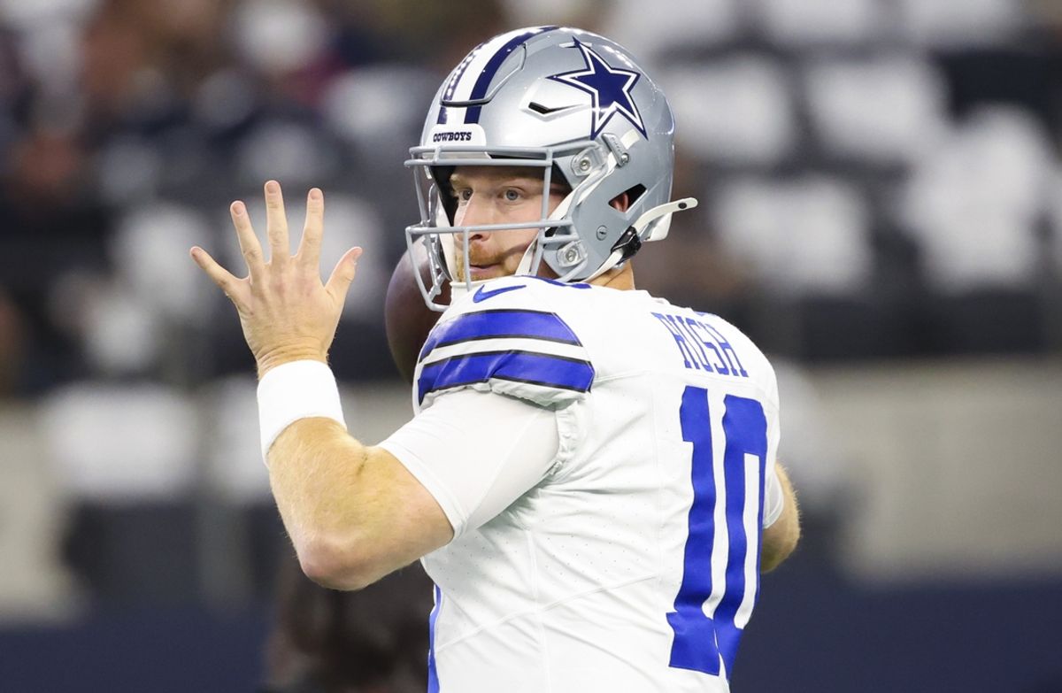 Nov 18, 2024; Arlington, Texas, USA;  Dallas Cowboys quarterback Cooper Rush (10) warms up before the game against the Houston Texans at AT&T Stadium. Mandatory Credit: Kevin Jairaj-Imagn Images
