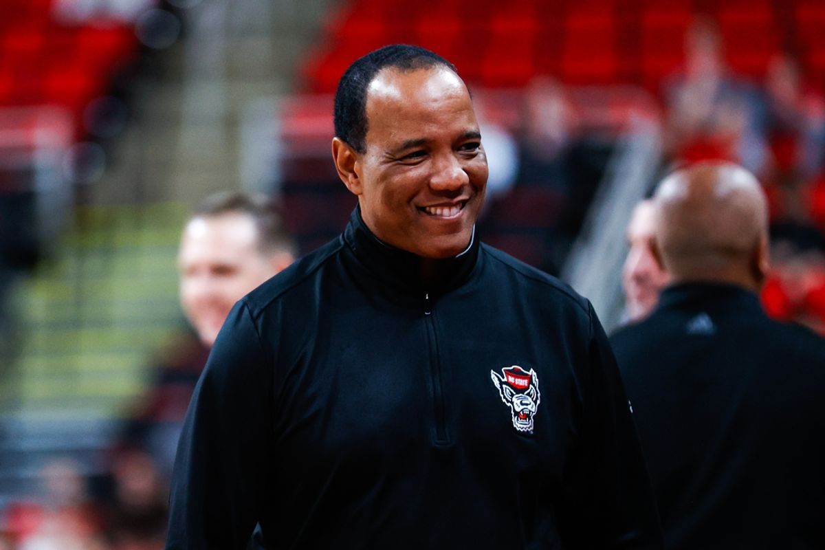 Nov 18, 2024; Raleigh, North Carolina, USA;  North Carolina State Wolfpack head coach Kevin Keatts smiles prior to the first half of the game against the Colgate Raiders at Lenovo Center. Mandatory Credit: Jaylynn Nash-Imagn Images