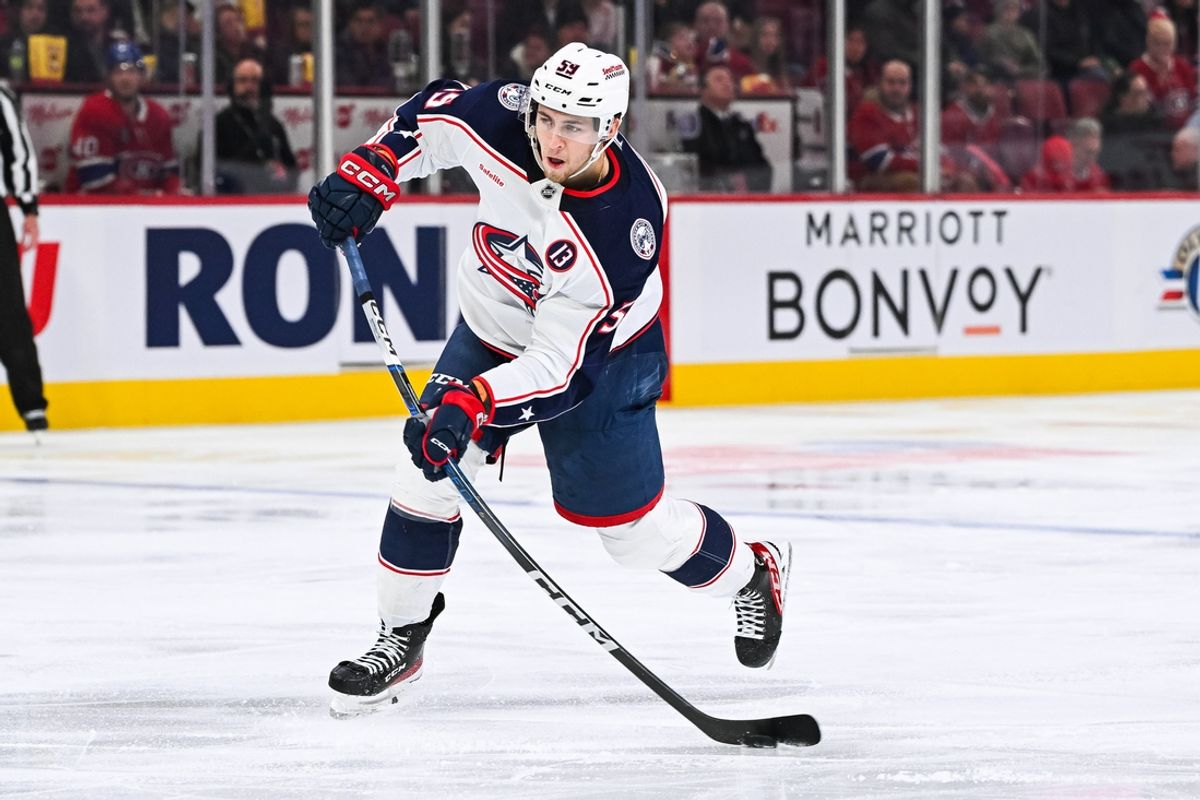 Nov 16, 2024; Montreal, Quebec, CAN; Columbus Blue Jackets right wing Yegor Chinakhov (59) shoots the puck against the Montreal Canadiens during the third period at Bell Centre. Mandatory Credit: David Kirouac-Imagn Images