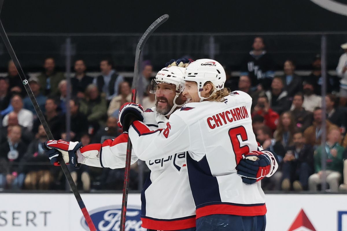 Nov 18, 2024; Salt Lake City, Utah, USA; Washington Capitals left wing Alex Ovechkin (left) celebrates a goal with defenseman Jakob Chychrun (6) against the Utah Hockey Club during the first period at Delta Center. Mandatory Credit: Rob Gray-Imagn Images