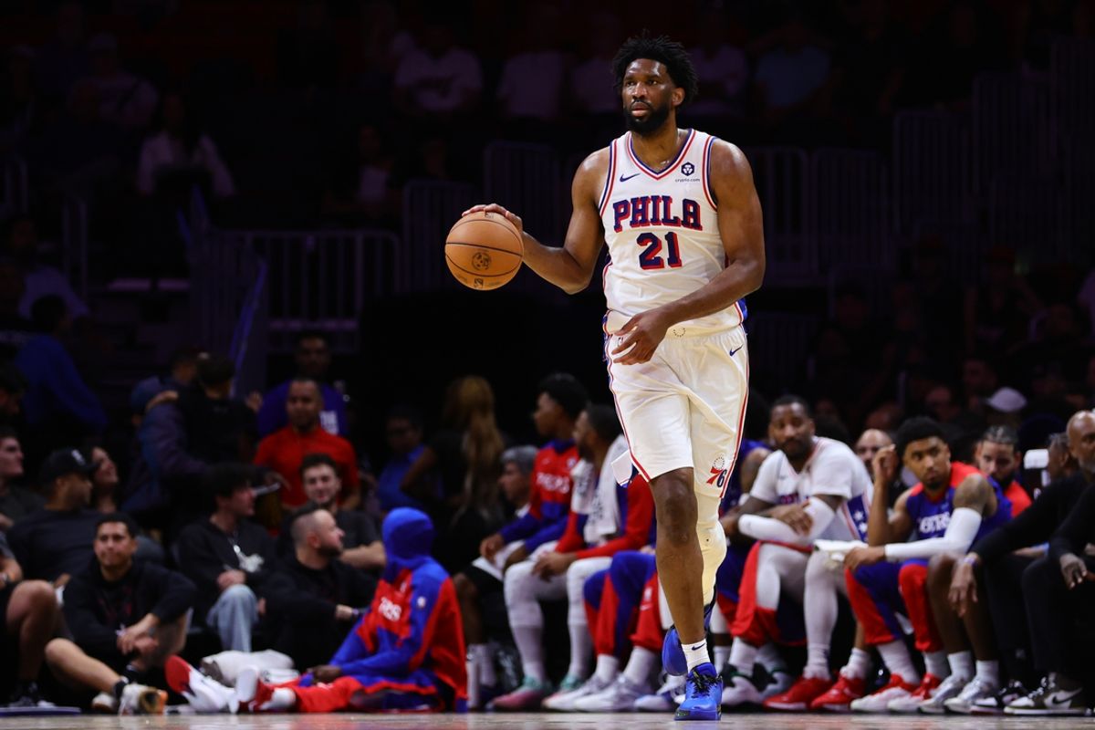Nov 18, 2024; Miami, Florida, USA; Philadelphia 76ers center Joel Embiid (21) dribbles the basketball against the Miami Heat during the fourth quarter at Kaseya Center. Mandatory Credit: Sam Navarro-Imagn Images
