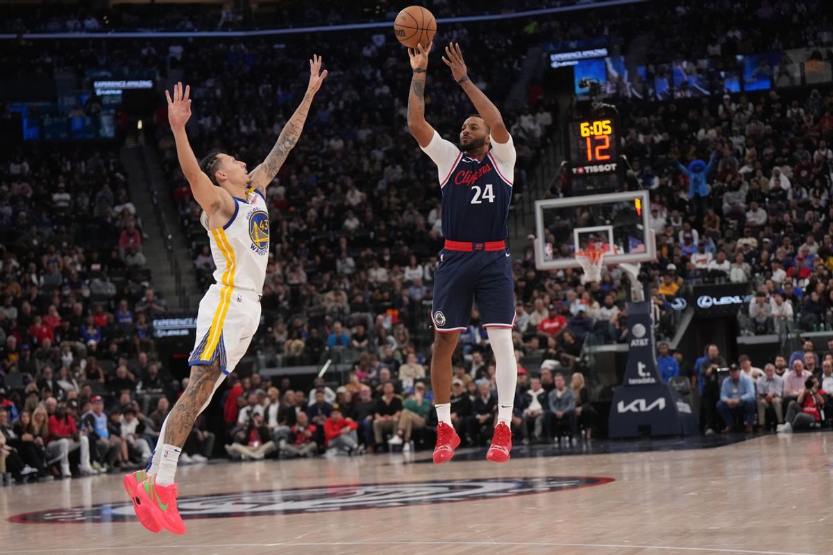 Nov 18, 2024; Inglewood, California, USA; LA Clippers guard Norman Powell (24) shoots the ball against Golden State Warriors forward Lindy Waters III (43) in the second half at Intuit Dome. Mandatory Credit: Kirby Lee-Imagn Images