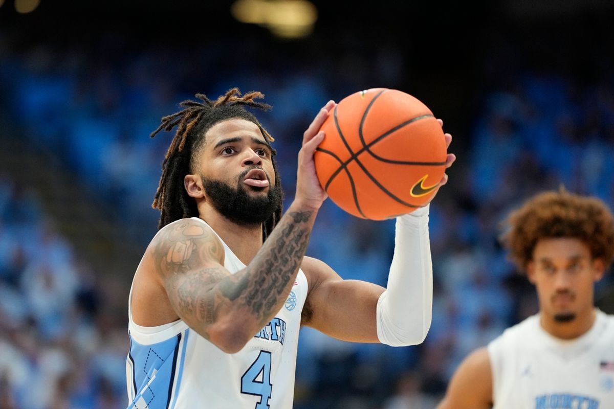 Nov 15, 2024; Chapel Hill, North Carolina, USA; North Carolina Tar Heels guard RJ Davis (4) shooting a free throw in the second half at Dean E. Smith Center. Mandatory Credit: Bob Donnan-Imagn Images