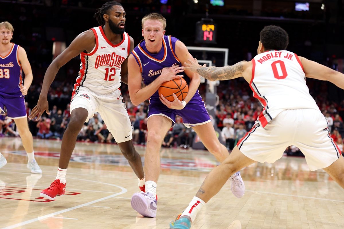 Nov 19, 2024; Columbus, Ohio, USA;  Evansville Aces guard Tanner Cuff (1) dribbles the ball as Ohio State Buckeyes guard Evan Mahaffey (12) defends during the first half at Value City Arena. Mandatory Credit: Joseph Maiorana-Imagn Images