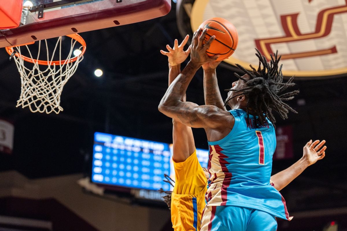 Hofstra's TJ Gadsden challenges Florida State at the Donald L. Tucker Civic Center on Tuesday, Nov. 19, 2024.