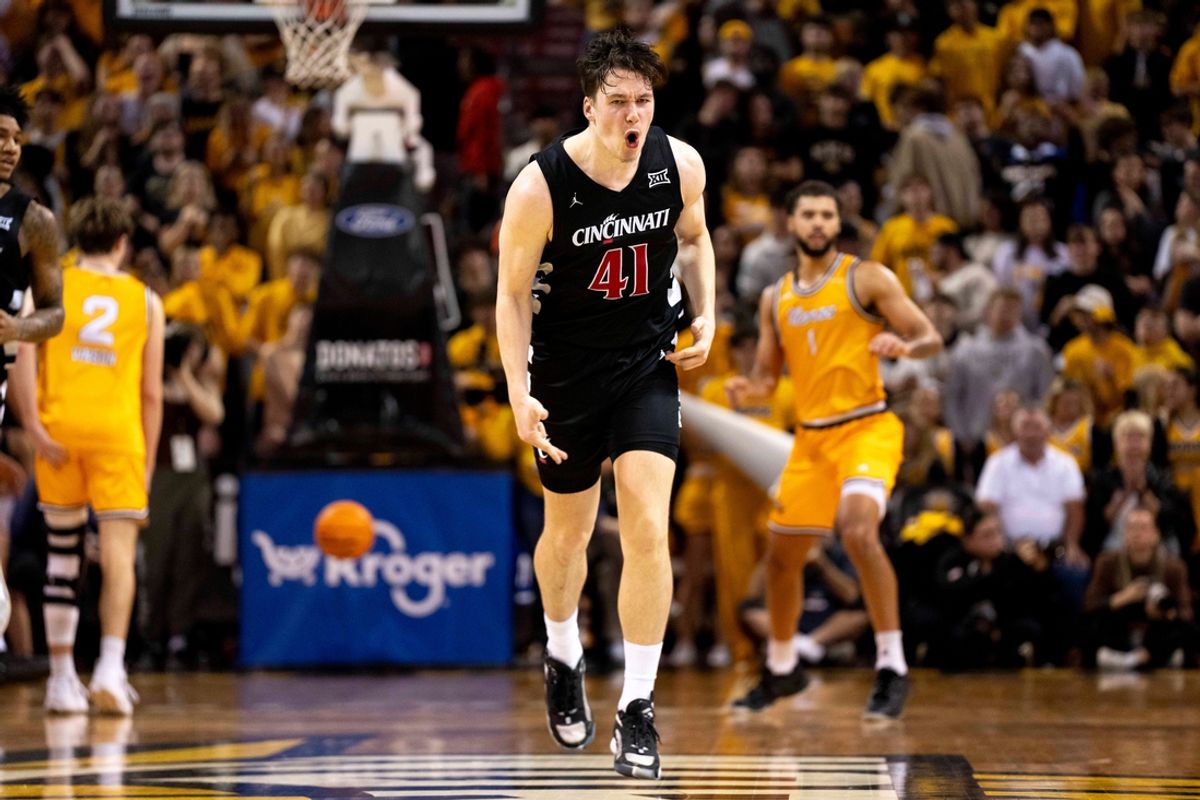 Cincinnati Bearcats guard-forward Simas Lukošius (41) reacts to hitting a 3-point basket in the second half of the NCAA basketball game at Truist Arena in Highland Heights, Ky., on Tuesday, Nov. 19, 2024.
