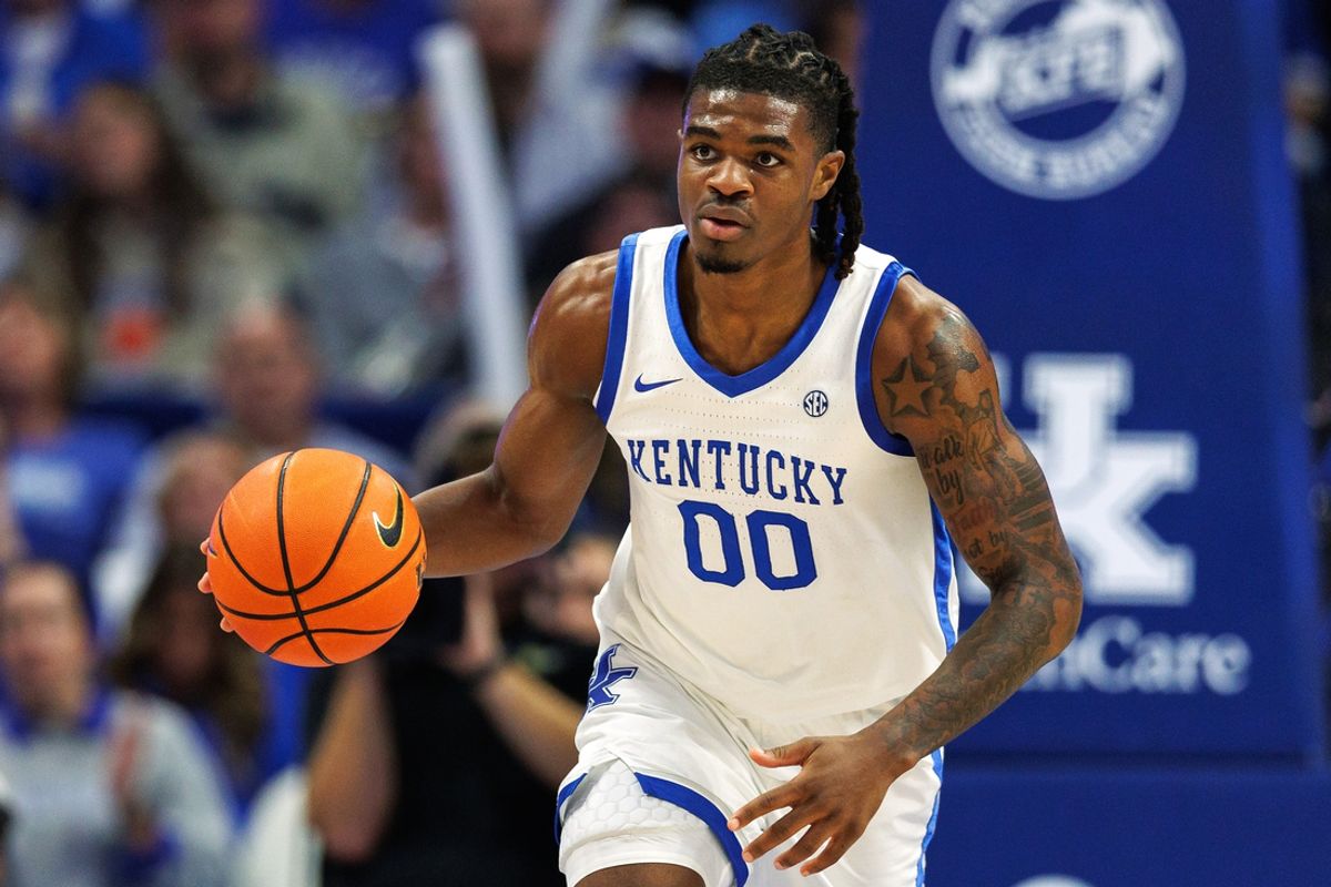 Nov 19, 2024; Lexington, Kentucky, USA; Kentucky Wildcats guard Otega Oweh (00) brings the ball up court during the second half against the Lipscomb Bisons at Rupp Arena at Central Bank Center. Mandatory Credit: Jordan Prather-Imagn Images