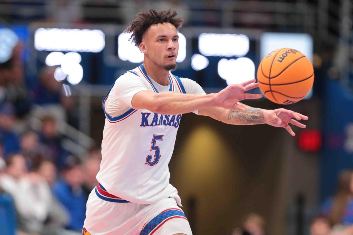 Kansas Jayhawks guard Zeke Mayo (5) passes the ball during the second half of the game inside Allen Fieldhouse Tuesday, Nov. 19, 2024.