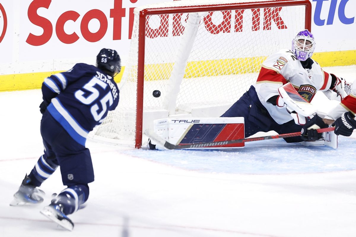 Nov 19, 2024; Winnipeg, Manitoba, CAN; Winnipeg Jets center Mark Scheifele (55) scores on Florida Panthers goaltender Sergei Bobrovsky (72) in the third period at Canada Life Centre. Mandatory Credit: James Carey Lauder-Imagn Images