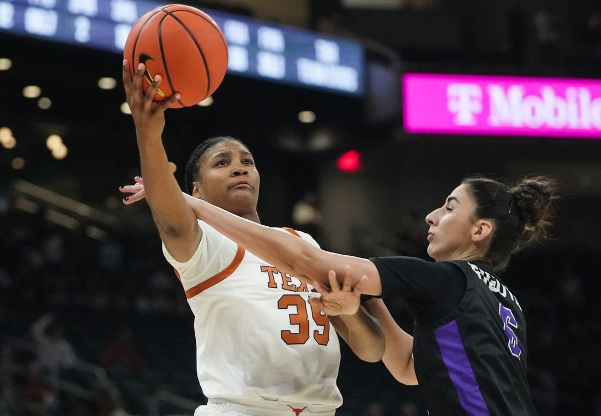 Texas Longhorns forward Madison Booker (35) is fouled by Tarleton State Angela Bigovic (6) in the fourth quarter at the Moody Center in Austin, Nov. 20, 2024.