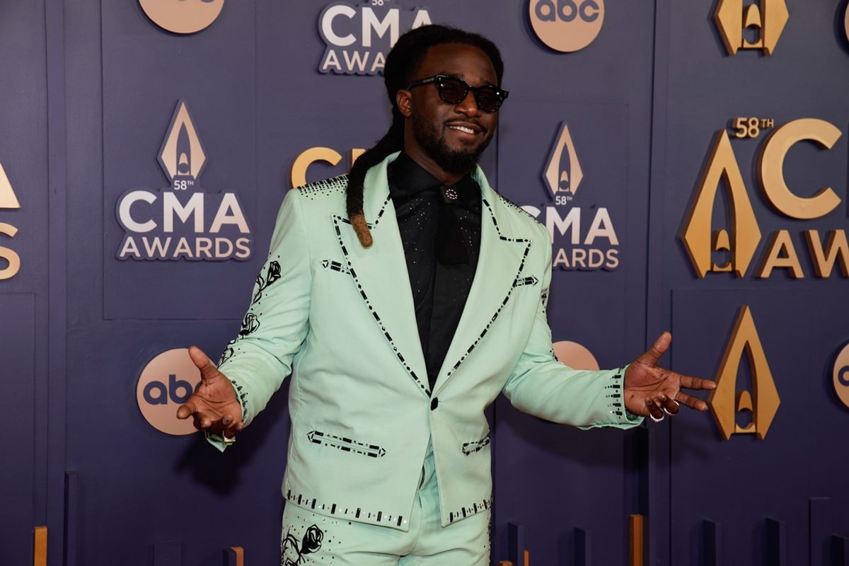 Shaboozey poses on the red carpet before the 58th Annual Country Music Association Awards in Nashville, Tenn., Wednesday, Nov. 20, 2024.