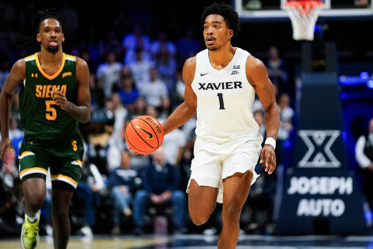 Xavier Musketeers guard Marcus Foster (1) handles the ball down the court in the second half of a college basketball game between the Xavier Musketeers and Siena Saints, Wednesday, Nov. 20, 2024, at Cintas Center in Cincinnati. Musketeers won 80-55.